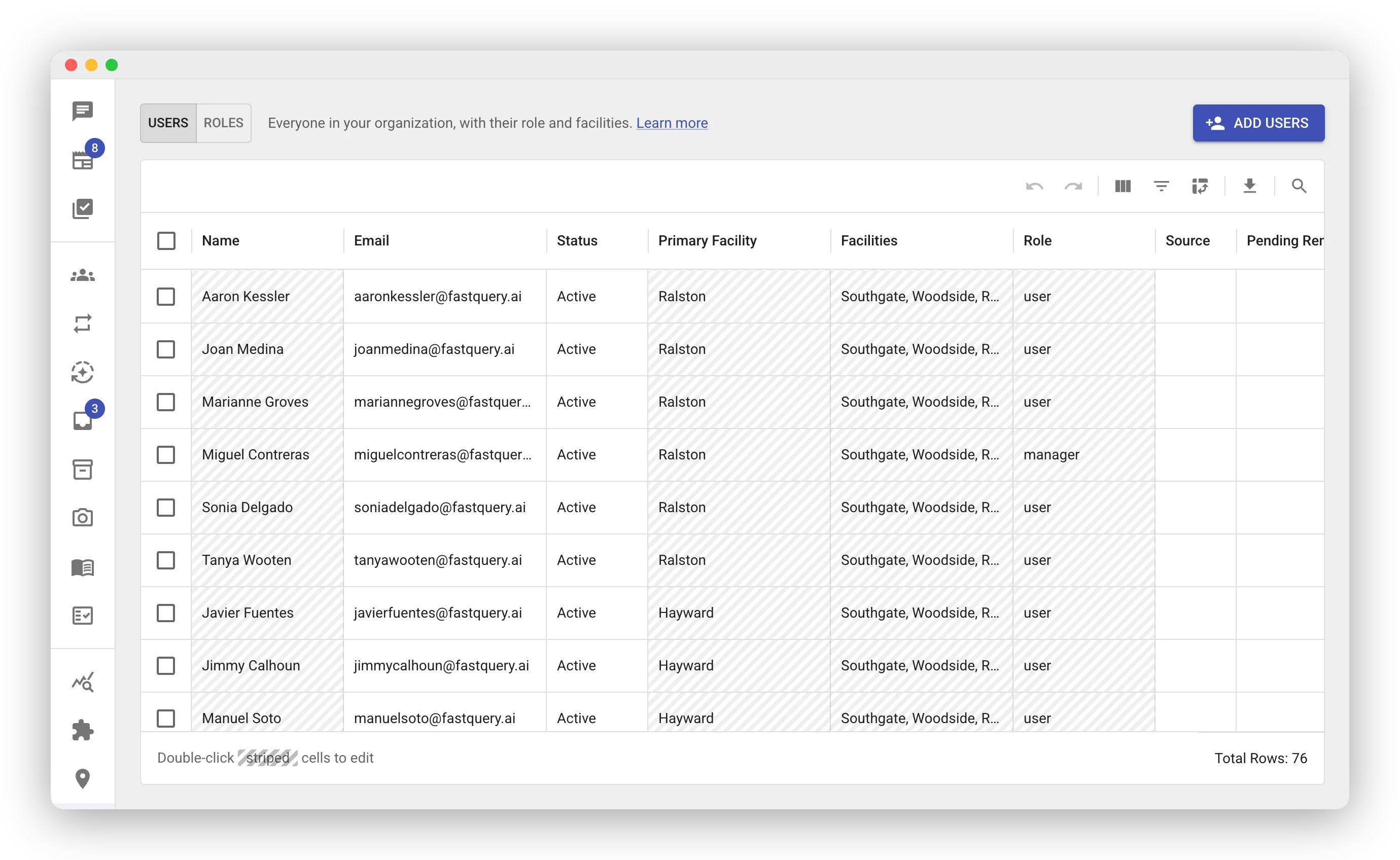 The Users tab of the Manage Users page. A grid lists team members with columns for Name, Email, Status, Primary Facility, Facilities, and Role. Tabs labeled USERS and ROLES sit above the grid, next to a blue ADD USERS button. The footer reads “Double-click striped cells to edit” and “Total Rows: 76”.