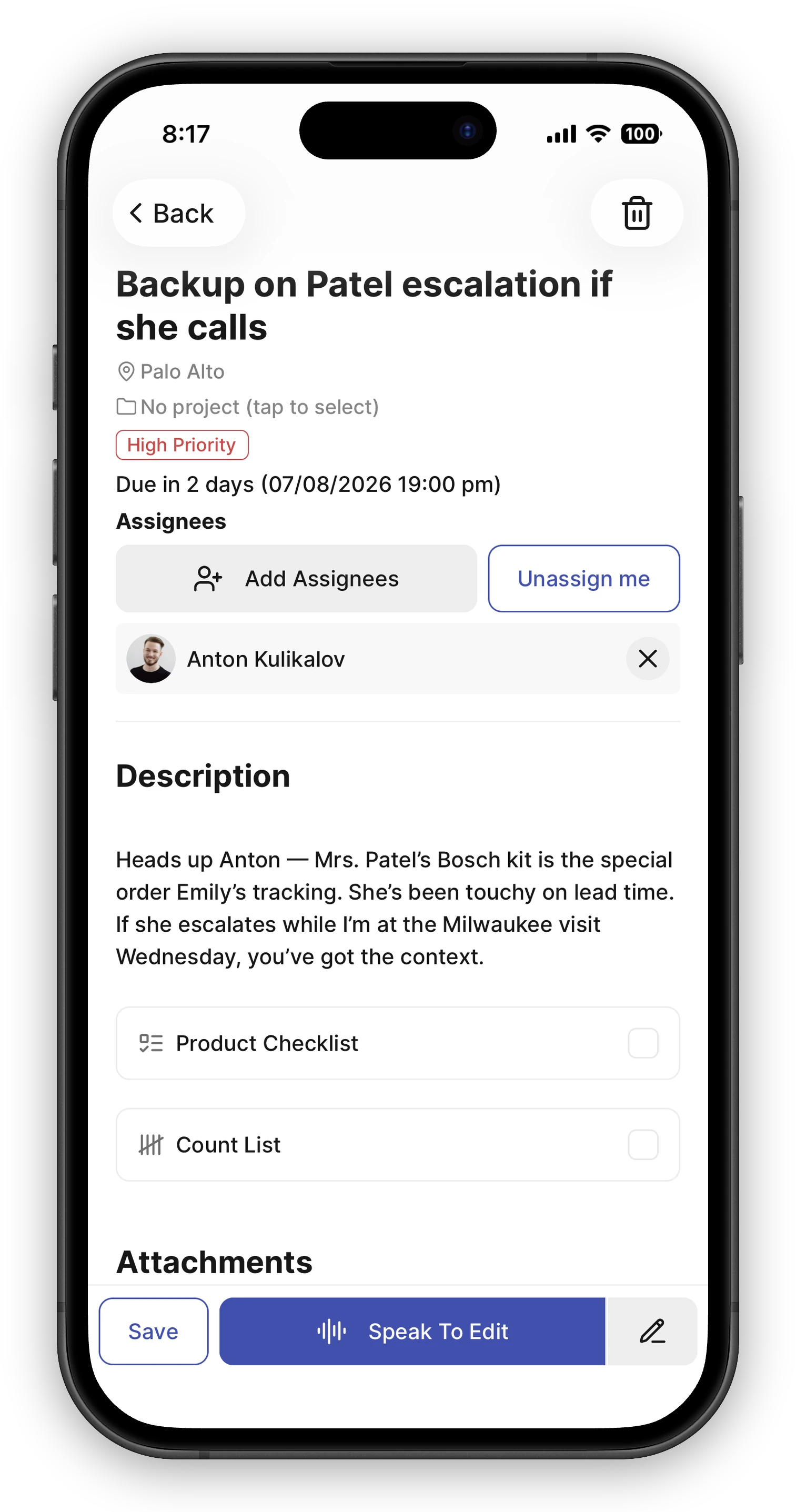 A task open in edit mode on mobile, with a trash icon button in the top-right corner of the header. Below it are the editable title, project selector, priority chip, due date, assignee list, and description.